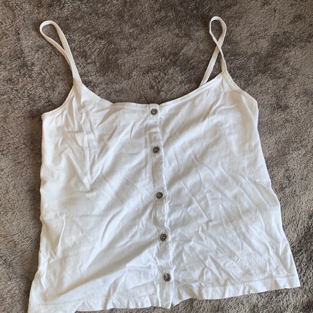 Baby blue tank top ( looks white but it’s blue)
